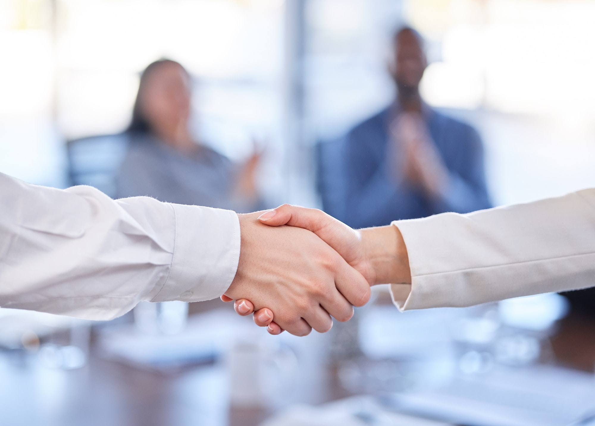 Handshake, teamwork and b2b partnership