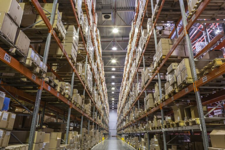 Interior of warehouse with racks full of boxes